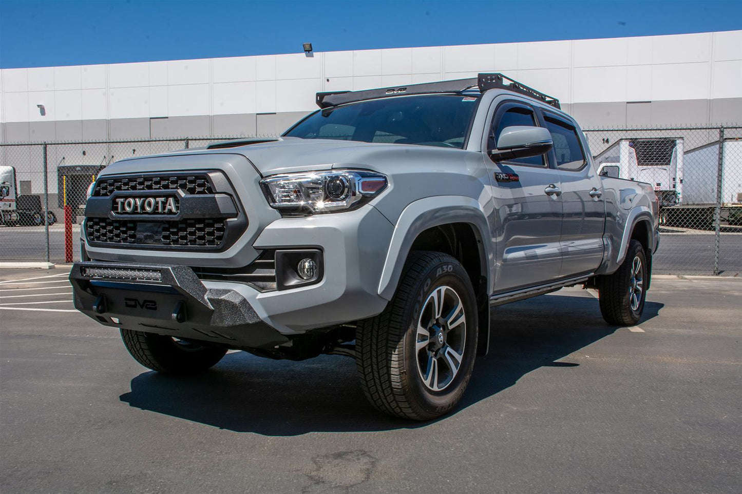 DV8 Offroad Front Bumper FBTT1-05 for Toyota Tacoma 2016-2023 heavy-duty cold rolled steel with skid plate compatibility