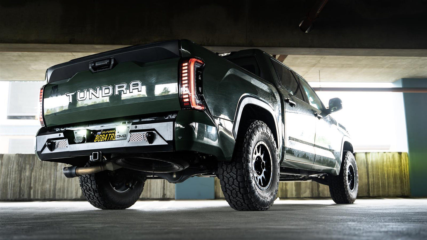 DV8 Offroad MTO Series Rear Bumper RBTT2-04 for Toyota Tundra 2022-2023 with pod light mounts and heavy-duty powdercoat finish
