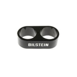 Bilstein B1 Reservoir Clamps - Black Anodized securing dual reservoir hoses with corrosion-resistant finish for off-road suspension systems