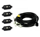 Baja Designs Universal White Rock Light Kit with four high-intensity LED lights and heavy-duty wiring harness for off-road vehicles
