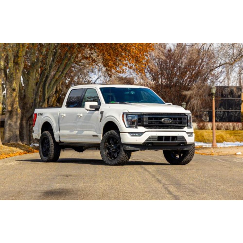 ReadyLift SST2.1 3.5 inch Lift Kit for F-150 (21-24) installed on white Ford F-150 with lifted suspension and off-road tires
