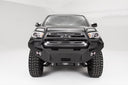 Fab Fours Premium Winch Pre-Runner Bumper TT16-B3652-1 for Toyota Tacoma 2005-2023 with heavy-duty winch-ready mount and D-ring mounts