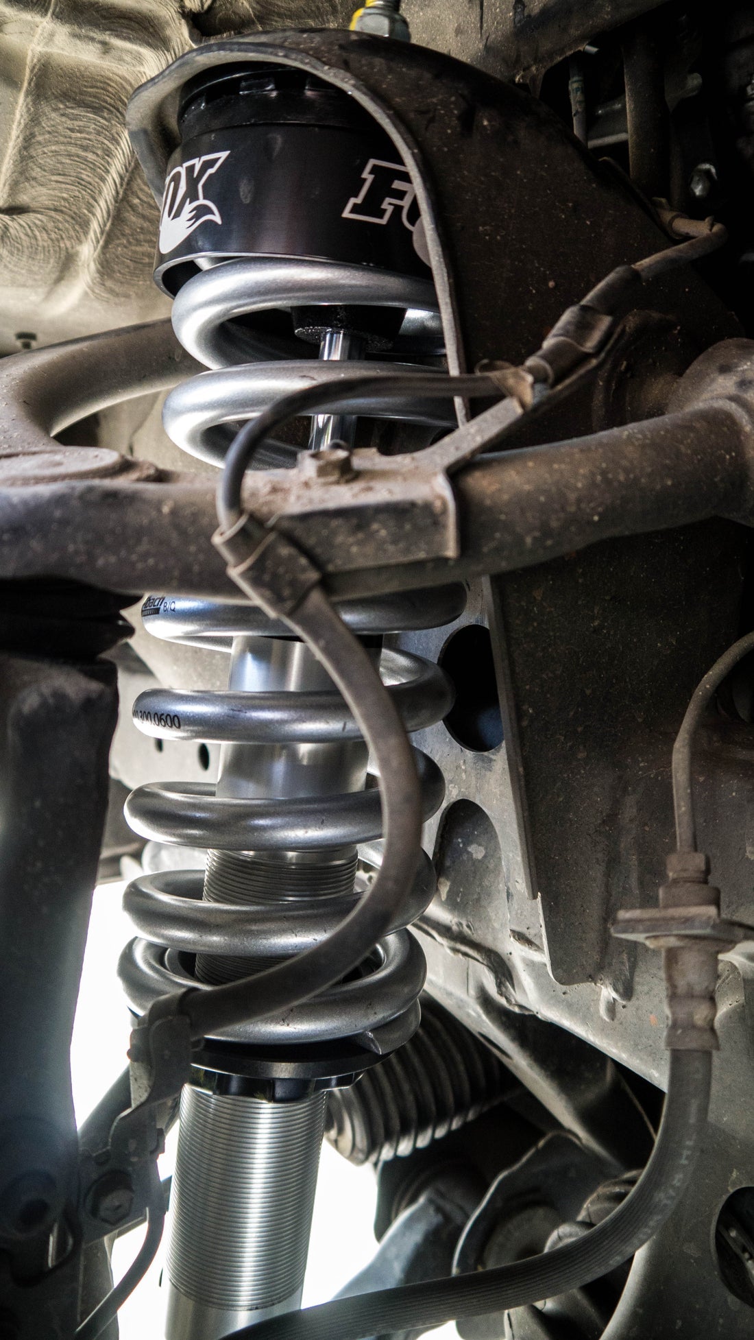 Fox Performance Series 2.0 Coil-Over Ifp Shock - 985-02-002 installed on 2021 Toyota Tacoma heavy-duty adjustable suspension coilover