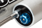 Fox Performance Series 2.0 Smooth Body Reservoir Shock - Adjustable - 985-26-016 close-up of blue speed control knob and braided stainless steel line