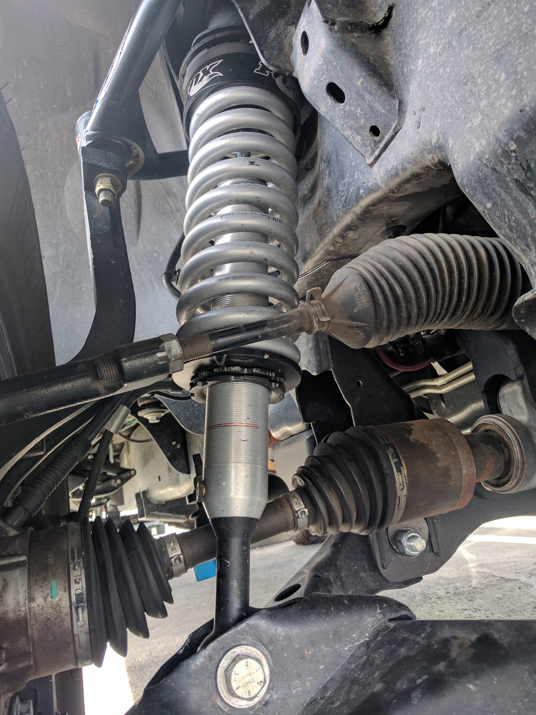 Fox Performance Series 2.0 Coil-Over Ifp Shock - 985-02-007 installed on 2021 Ford F-150 heavy-duty suspension system