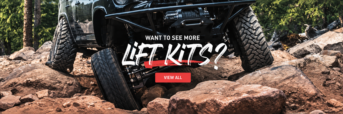 Black off road 4x4 with lifted suspension on rocky terrain with Lift Kits and View All banner text