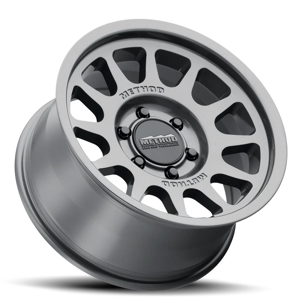 Method MR703 17x9 / -12mm Offset / 106.25mm Bore / 6x5.5 BP / 4.8in BS - Gloss Titanium Wheel by Method Wheels with A356 aluminum construction