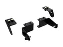 Black powder-coated adjustable mounting brackets with bolts, designed for suspension or lift kit installation.