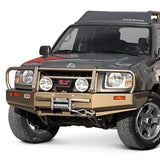 ARB Deluxe Front Winch Bumper 3438110 for Nissan Frontier (98-04) heavy-duty steel with winch mount and driving light provisions