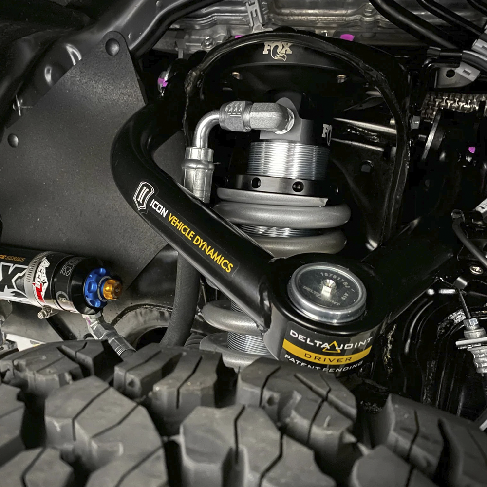 A picture of a Toyota Tundra 2007-2021 with an Icon Delta Joint Tubular Upper Control Arm Kit (58460DJ).