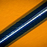 A close up of a yellow and blue ARB Touring Awning with Light 814409 strip with retractable awnings.