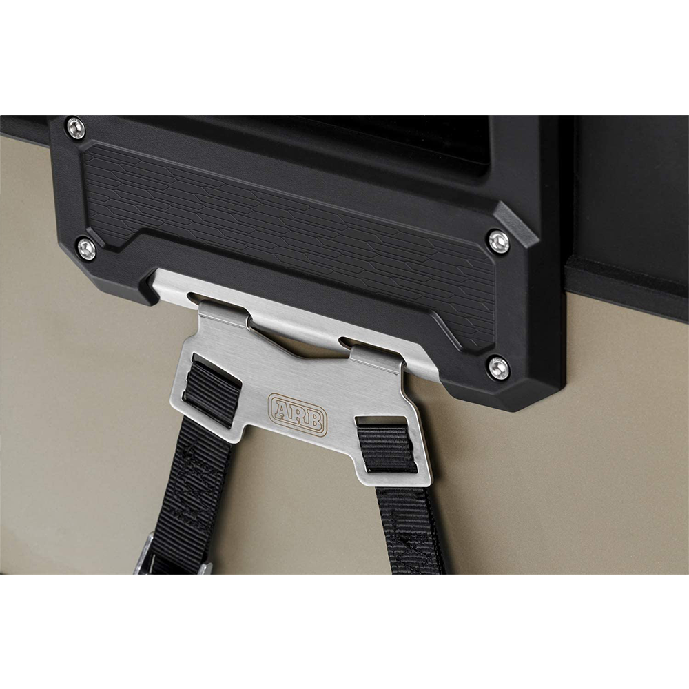 A black and white picture of a ARB Portable Fridge/Freezer Tie Down Kit for ZERO Fridge Freezers 10900046 mount brackets.
