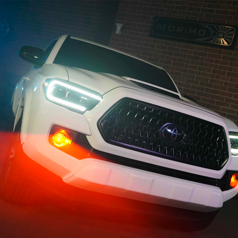 The aftermarket Morimoto XB LED headlights LF530.2 ASM enhance the front end of a Toyota Tacoma.