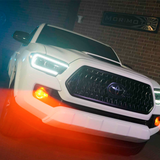 The aftermarket Morimoto XB LED headlights LF530.2 ASM enhance the front end of a Toyota Tacoma.