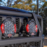 This ARB Intensity Solis 21 Flood/Flood Light Kit - SJB21FKIT dust- and waterproof truck accessory features a high-pressure diecast aluminum body and a virtually unbreakable polycarbonate lens.
