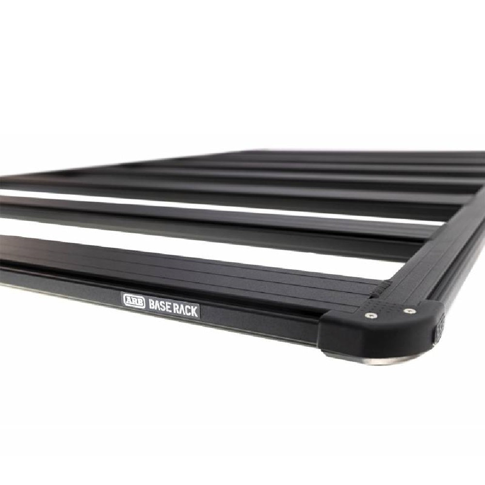 A black Base Rack for Toyota Land Cruiser 71 Series ARB 1770030 for cargo loading on a white background.