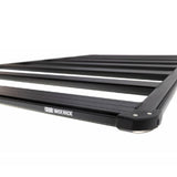 A black Base Rack for Toyota Land Cruiser 71 Series ARB 1770030 for cargo loading on a white background.