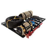 A ARB Rack for Toyota Land Cruiser 71 Series ARB 1770030 equipped with cargo loading accessories, featuring a tire and other items.
