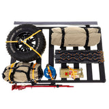An ARB Base Rack for Toyota Land Cruiser 71 Series ARB 1770030 with various accessories for cargo loading, including a tire.