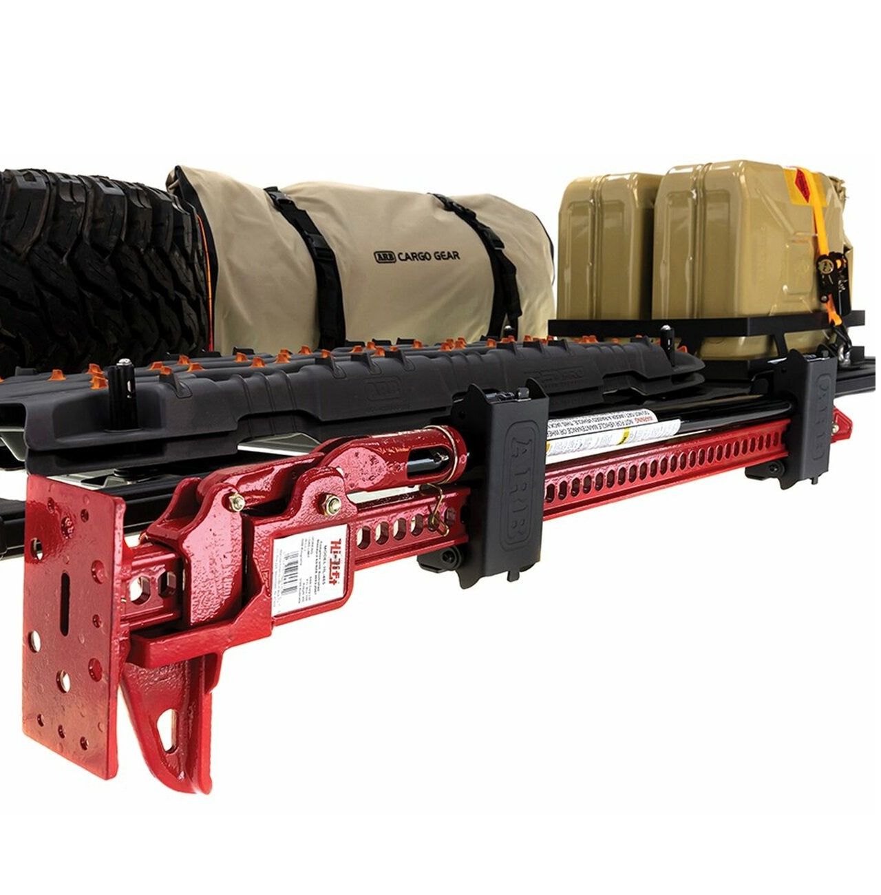 An ARB HiLift Mount Base Rack Farm Jack Holder (Pair) 1780280 with a red bag and a ratchet strap on it.