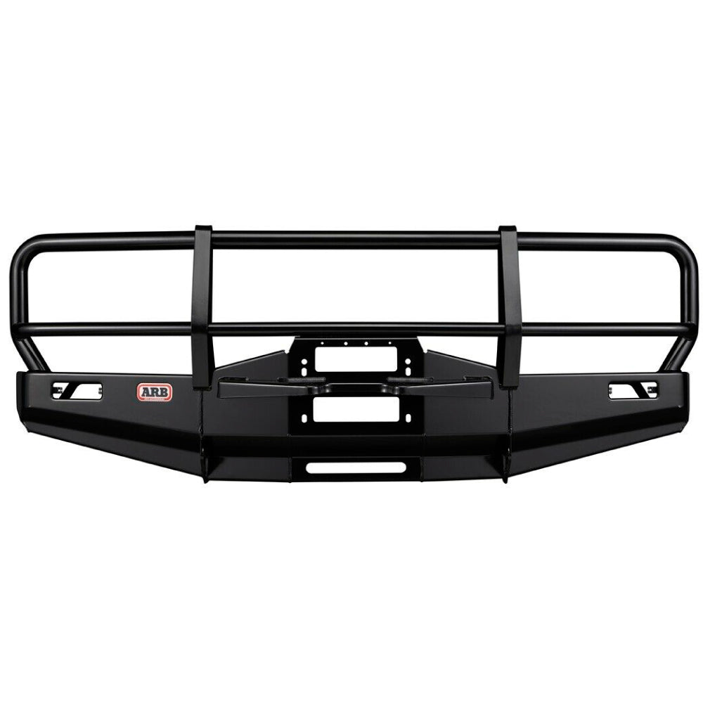 A durable ARB Deluxe Winch Front Bumper 3411050 for Land Cruiser 80 Series 1990-1997 bumper for a pickup truck.