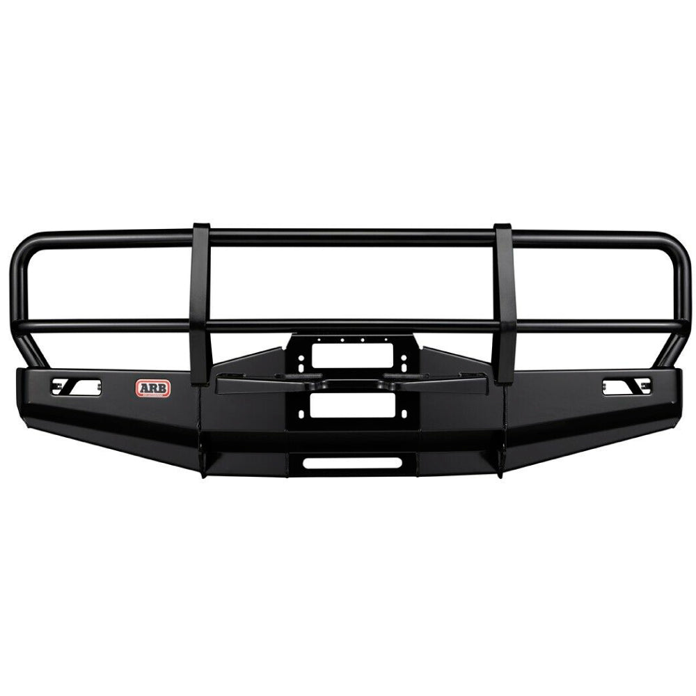 A durable ARB Deluxe Bull Bar 3414090 for Toyota 4Runner (1984-1986) Leaf Spring Model - non-Airbag, designed for a Toyota Land Cruiser pickup truck, providing maximum protection.