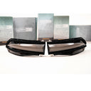 A pair of black Morimoto sunglasses with side marker lights sitting on top of a box.