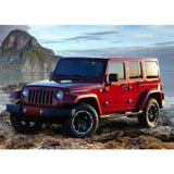 A red Old Man Emu Jeep Wrangler JK (4-Door) with adjustable Old Man Emu control arms parked on a rocky beach.