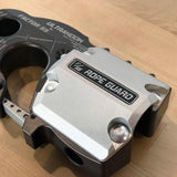 A Factor 55 Ultrahook XTV Rope Guard 00382 placed on a wooden table.