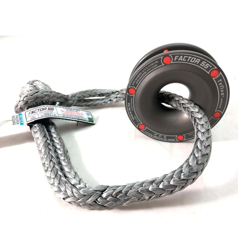 A Factor 55 Rope Retention Pulley Snatch Block 00260 with a ring attached to it, suitable for use with a winch.
