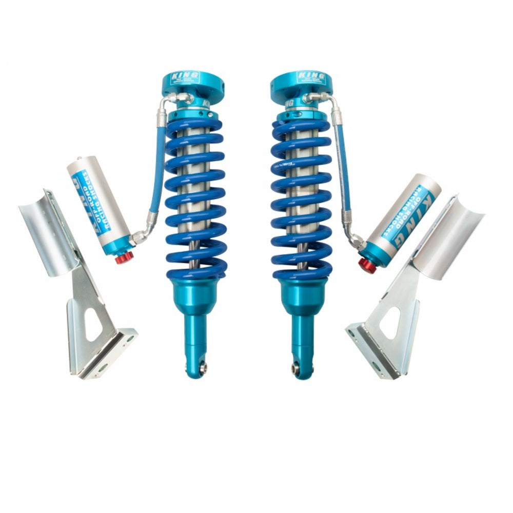 A bolt-on suspension system featuring a pair of King Shocks Front 2.5 Remote Reservoir Coilover w/Adjuster for Toyota Tacoma 2005-ON against a white background, perfect for shock upgrade kits and off-road performance.