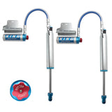 A pair of blue King Shocks Rear 2.5 Remote Reservoir Shocks w/Adjuster for Toyota Tacoma 2005-ON with a bolt-on suspension system.