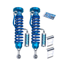 Load image into Gallery viewer, A pair of King Shocks 2.5 Front Coilover w/Remote Reservoir (PAIR) for Toyota Tundra 2007-ON on a white background.