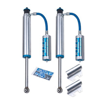 Load image into Gallery viewer, A pair of King Shocks Rear 2.5 Remote Reservoir Shocks (PAIR) for Toyota Tundra 2007-2021 with a blue handle and bolt-on suspension system.