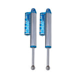 A pair of high-quality King Shocks Rear 2.5 Piggyback Reservoir Shock (PAIR) for RAM 1500 09-18 (4WD) on a white background, perfect as shock upgrade kits for any suspension system.