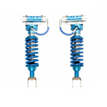 Load image into Gallery viewer, A pair of King Shocks Front 2.5 Remote Reservoir Ext. Travel Coilover (PAIR) for RAM 1500 19-ON (4WD) made with high-quality materials on a white background.