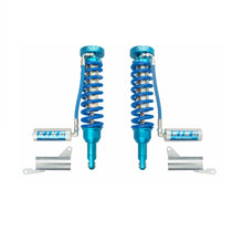 Load image into Gallery viewer, A pair of King Shocks Front 2.5 Remote Reservoir Coilover on a white background. These bolt on suspension system shock upgrade kits offer OEM performance enhancements.