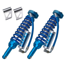 Load image into Gallery viewer, A pair of King Shocks Front 2.5 Remote Reservoir Coilover (PAIR) for Toyota LandCruiser 200 Series on a white background, featuring a suspension system.