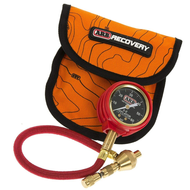 A pouch containing an ARB E-Z Deflator Tire Deflator ARB505 tire pressure gauge with psi readings.