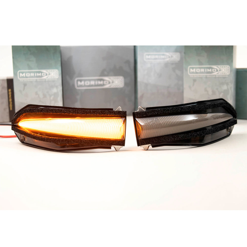 A pair of Morimoto XB LED Mirror Lights LFM16 for Toyota 4Runner (2014 - 2021), black and yellow, next to each other.