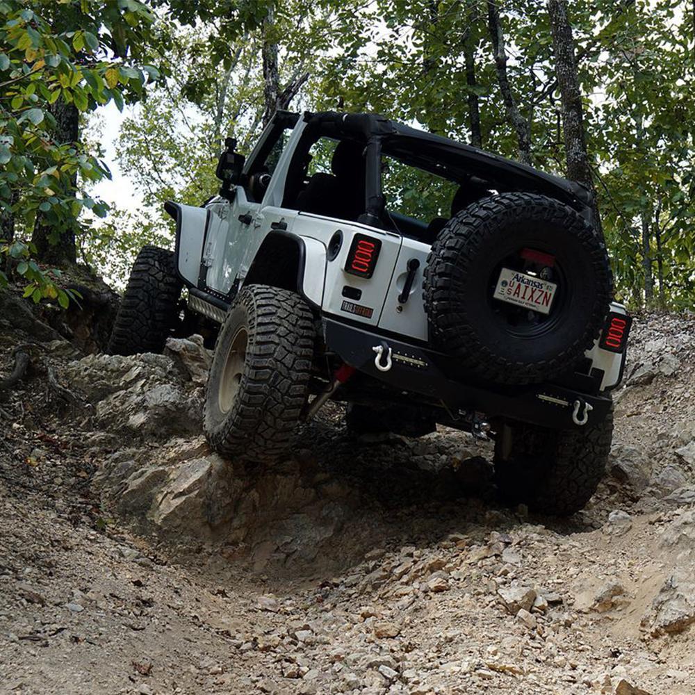 A durable white ARB jeep maneuvers with great traction on a rocky trail, equipped with the ARB RD163 Air Locker Differential Dana 60 with 30 Splines.