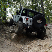 Load image into Gallery viewer, A durable white ARB jeep maneuvers with great traction on a rocky trail, equipped with the ARB RD163 Air Locker Differential Dana 60 with 30 Splines.