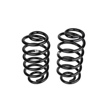 Load image into Gallery viewer, A pair of Old Man Emu rear coil springs 2996 for Jeep Wrangler LJ 03-06 on a white background with easy installation.