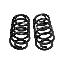 Load image into Gallery viewer, A pair of black ARB Old Man Emu Rear Coil Springs 2996 with easy installation on a white background for Jeep Wrangler LJ 03-06.
