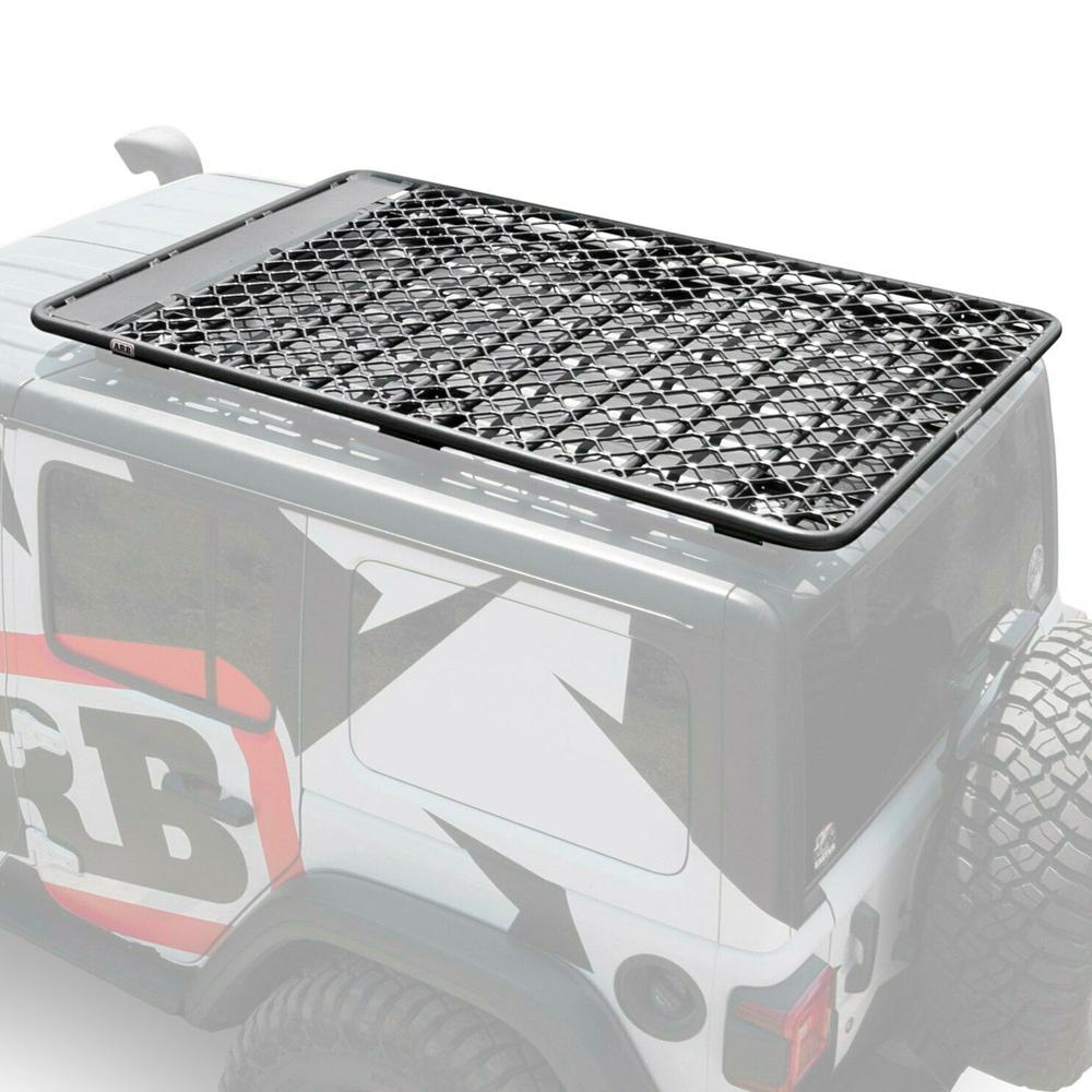 A jeep with a secure storage Alloy Flat Roof Rack 70” x 44” with Mesh Floor for Jeep Wrangler JL 2018-2019 ARB 4913020MKJL fitted using a fitting kit.