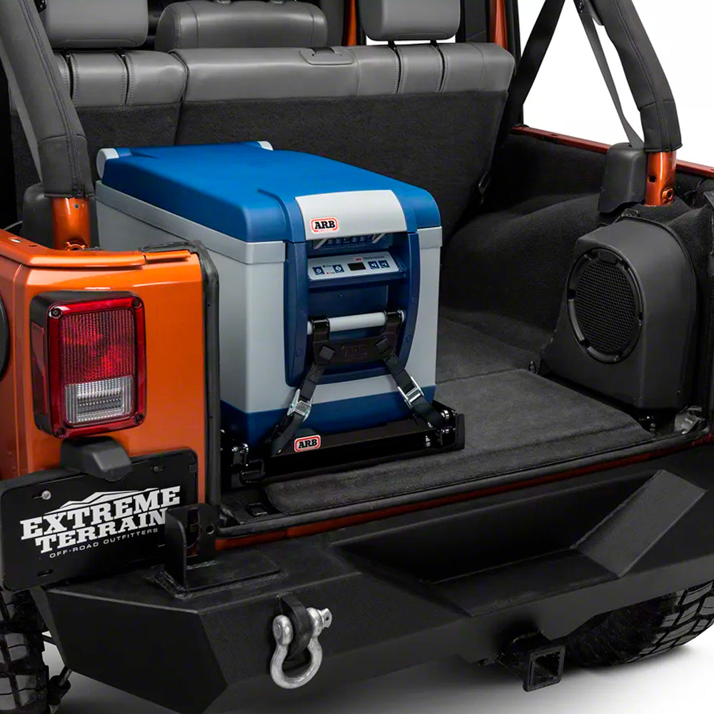 Product Description: Enhance your off-road adventures with the ultimate addition to your jeep - an ARB Fridge Freezer 82 Qt 10800782 conveniently positioned in the back. Stay refreshed and keep your drinks chilled as you conquer rugged terrains, all with ARB.