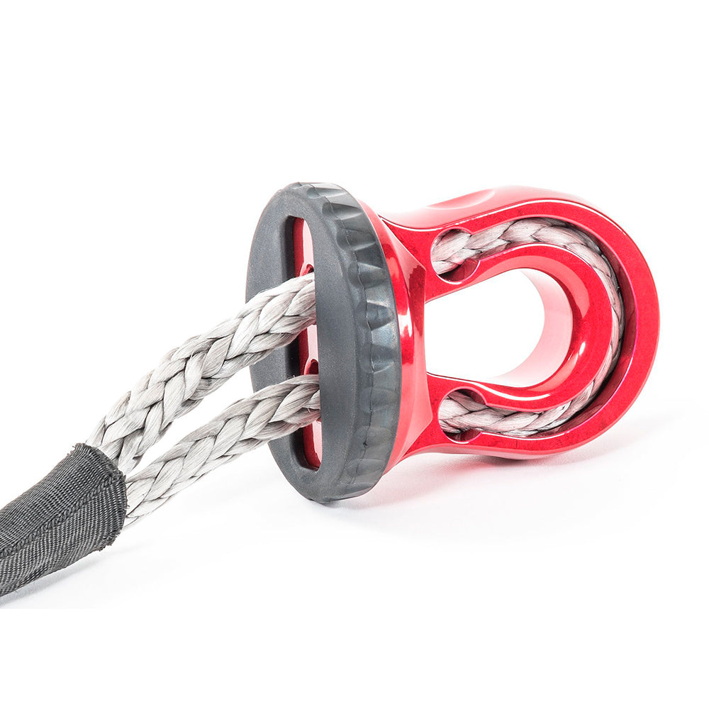 A Factor 55 Splicer Shackle Mount Thimble in Red 00352-01, a red and black synthetic winch rope with a thimble attached for added protection.