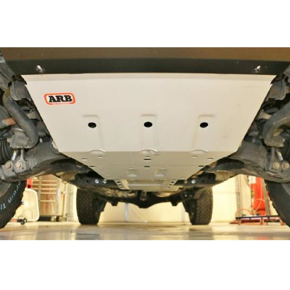 The ARB Under Vehicle Protection Kit 5423010 For Toyota Tacoma (2005-2023) of a vehicle-specific truck with a 4WD drivetrain in a garage.