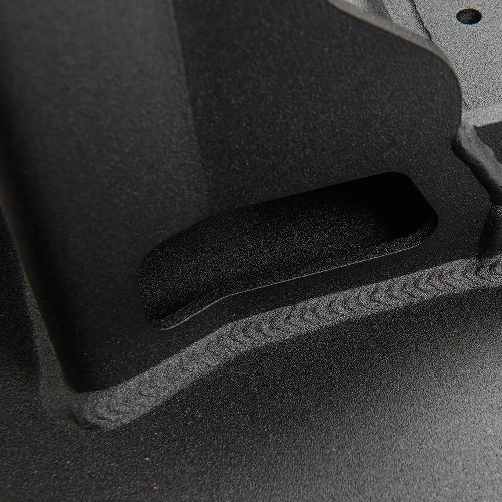A close up of a Sahara Style Modular Winch Bumper Kit ARB 2236020 with secure mounting points on a table.