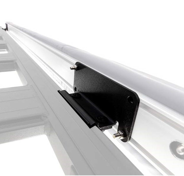 A close-up image of a white rail with a black handle, featuring an ARB BASE Rack Awning Bracket 1780240 by ARB.